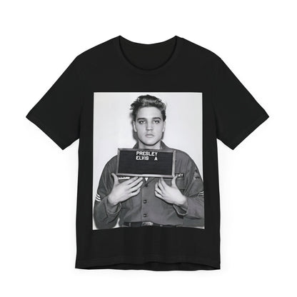 A black graphic t-shirt featuring a retro mugshot photo of Elvis Presley.