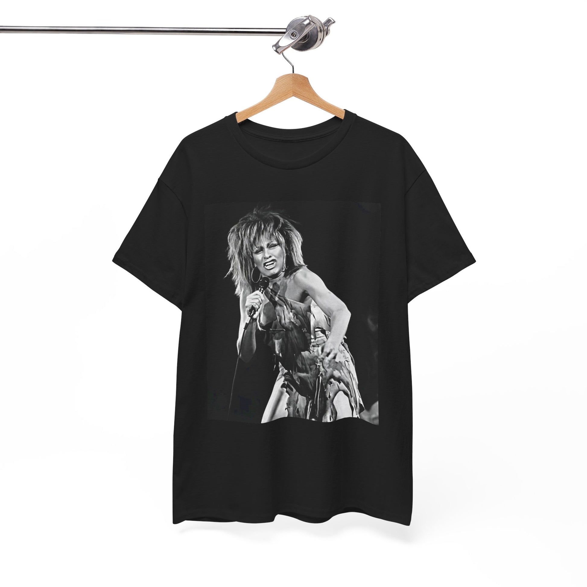 A black graphic t-shirt featuring a graphic of Tina Turner as an inspiring legend.