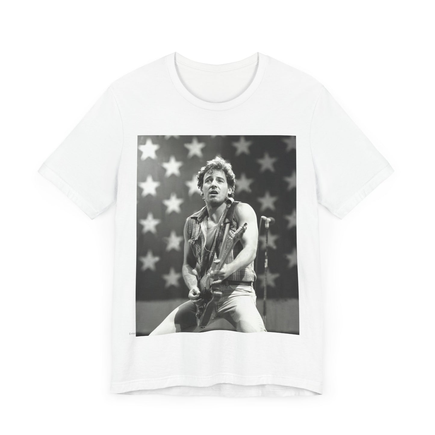 A black graphic t-shirt featuring a black and white graphic of Bruce Springsteen with an American flag background or elements.