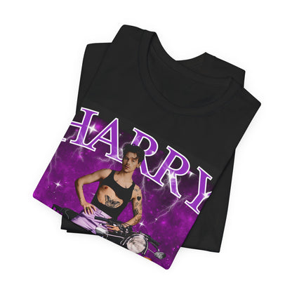 A black graphic t-shirt featuring a neon bootleg graphic of Harry Styles.