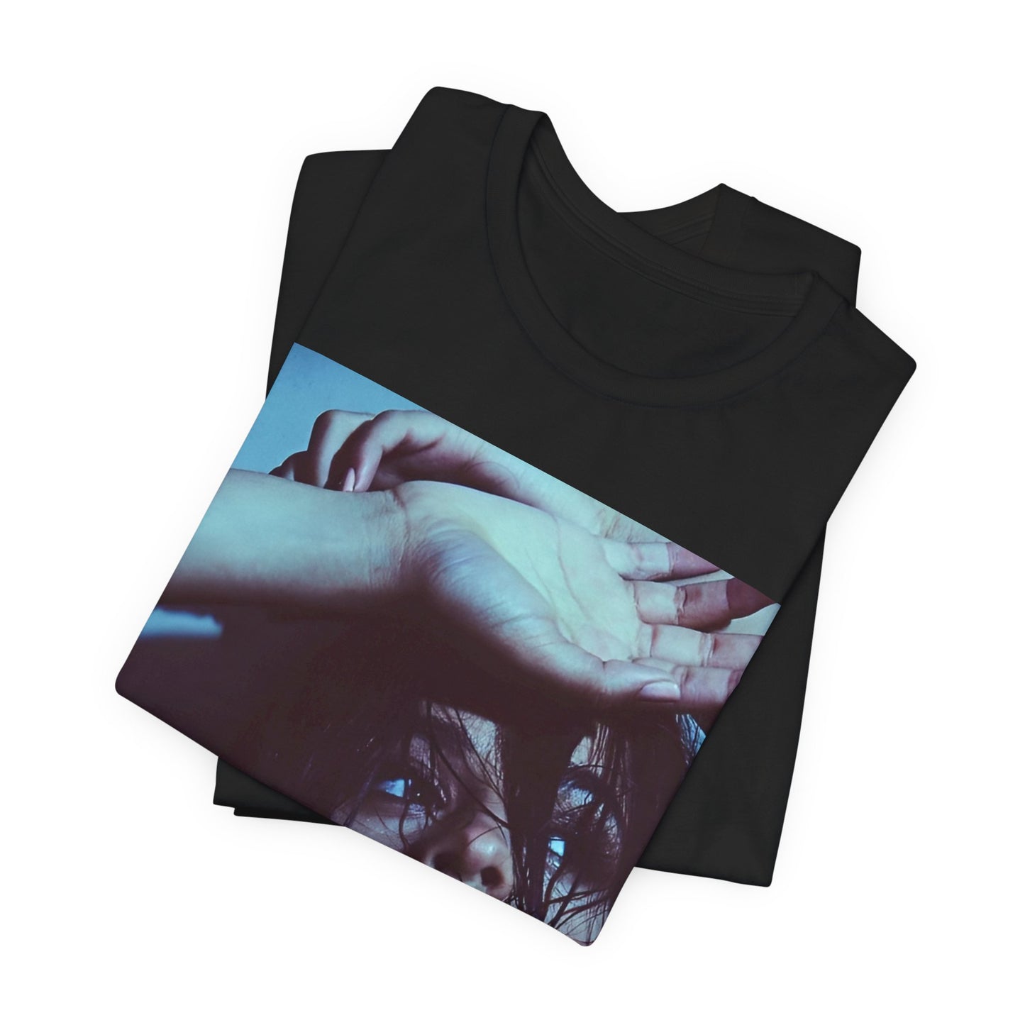 A black graphic t-shirt featuring a graphic related to Camila Cabello's "Señorita" song, possibly with dance-inspired elements.
