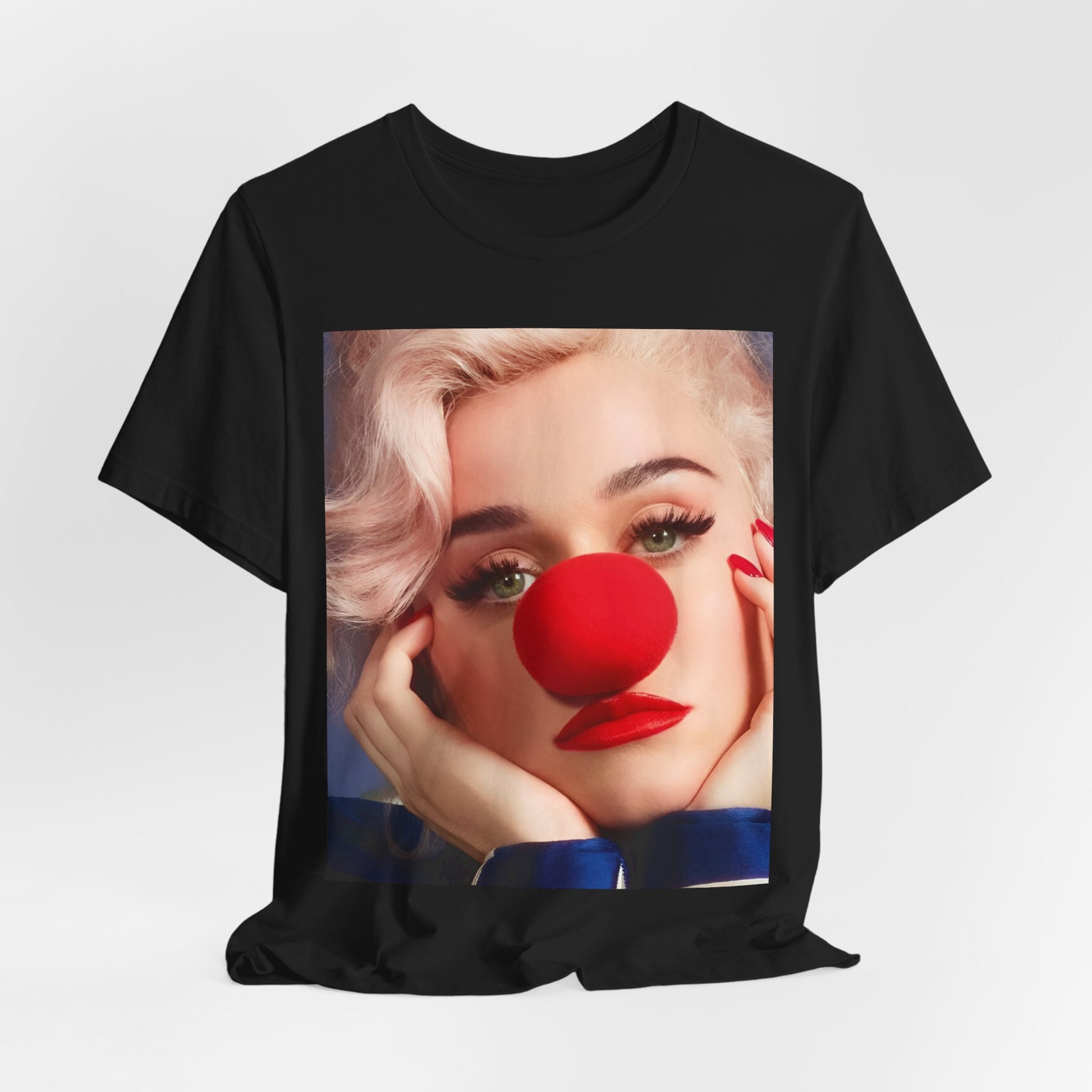 A black graphic t-shirt featuring a graphic related to Katy Perry's 'Smile' album.