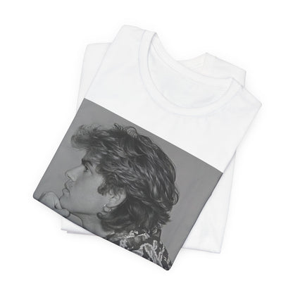 A black graphic t-shirt featuring a graphic of George Michael from his 80s Wham! era.
