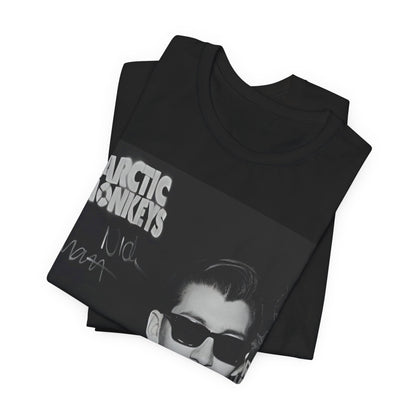 A black graphic t-shirt featuring a black and white portrait photo of Alex Turner from Arctic Monkeys, showing his signature look.