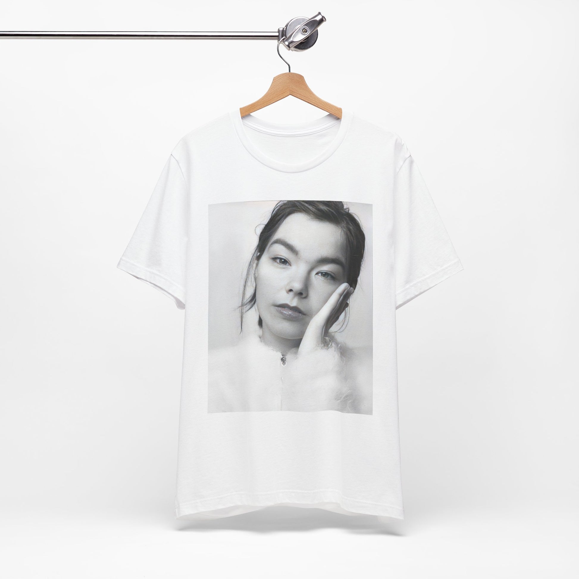 A black graphic t-shirt featuring a graphic related to Bjork's 'Post' album era, possibly with album art elements.