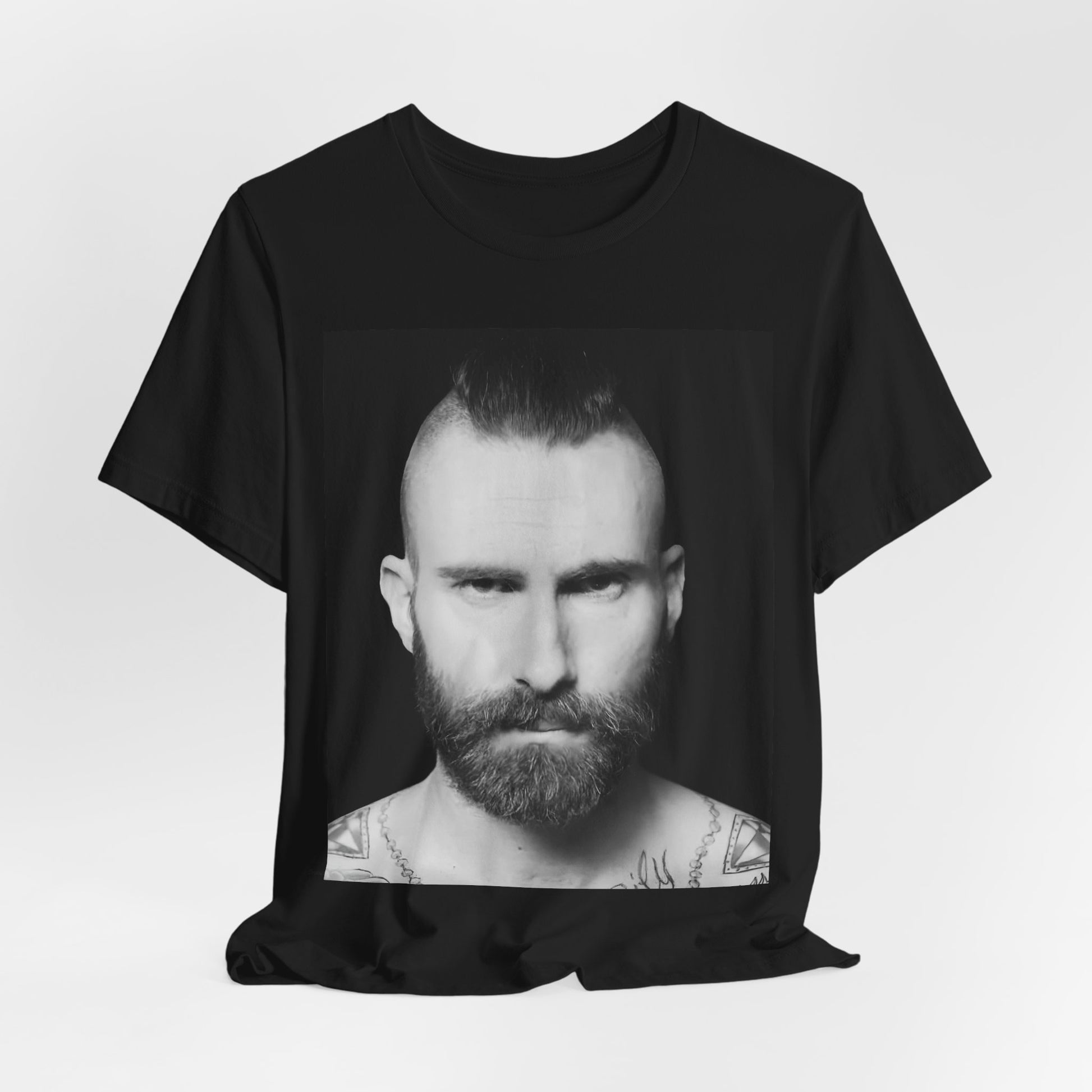 A sharp, polished studio portrait of Maroon 5 frontman Adam Levine, printed on a graphic t-shirt.