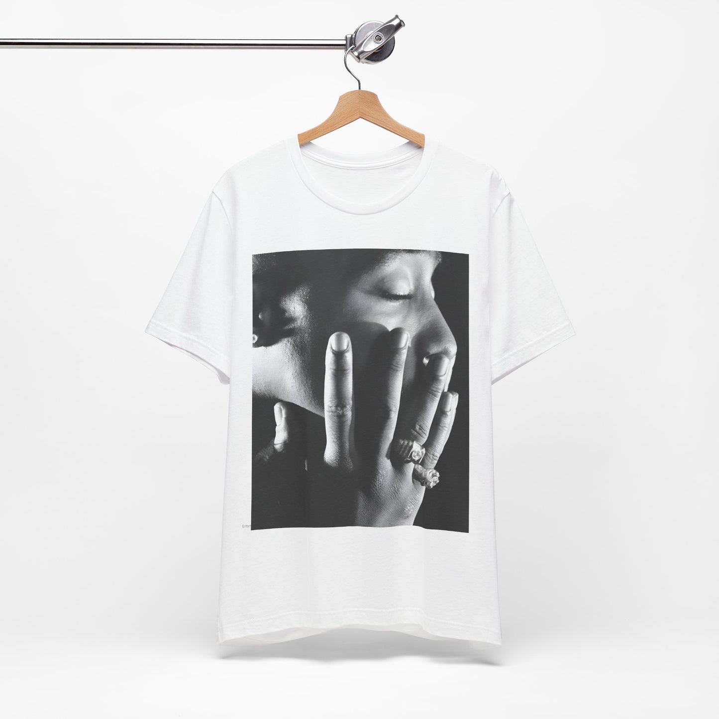 A black graphic t-shirt featuring an iconic West Coast swag graphic of Tupac.