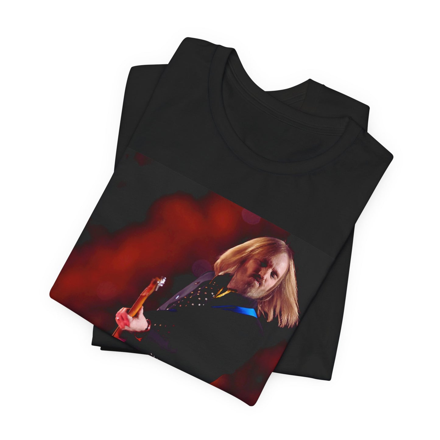 A black graphic t-shirt featuring a graphic or photo of Tom Petty as a powerhouse live performer.