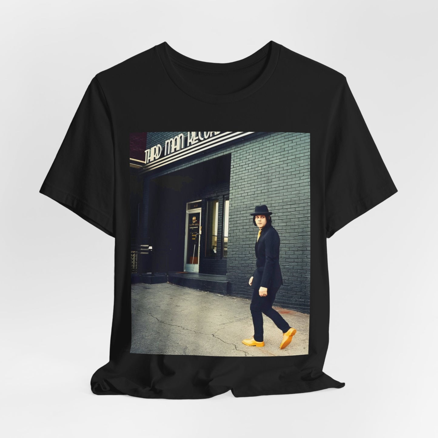 A black graphic t-shirt featuring a garage rock graphic of The White Stripes.
