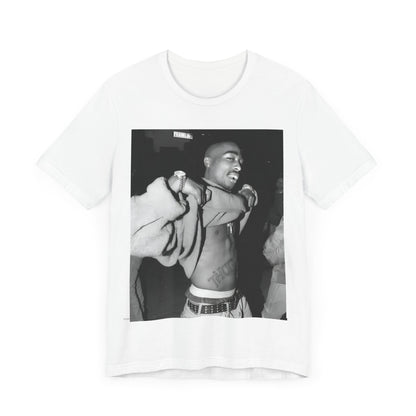 A black graphic t-shirt featuring a vintage hip hop icon graphic of Tupac.