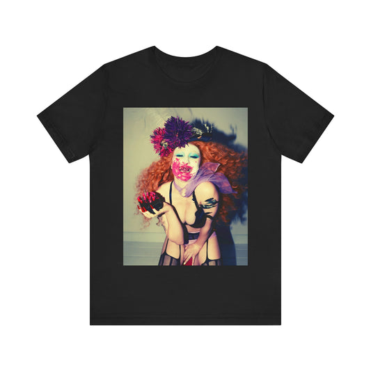 A black graphic t-shirt featuring a retro graphic related to Chappell Roan's 'Pink Pony Club' era.
