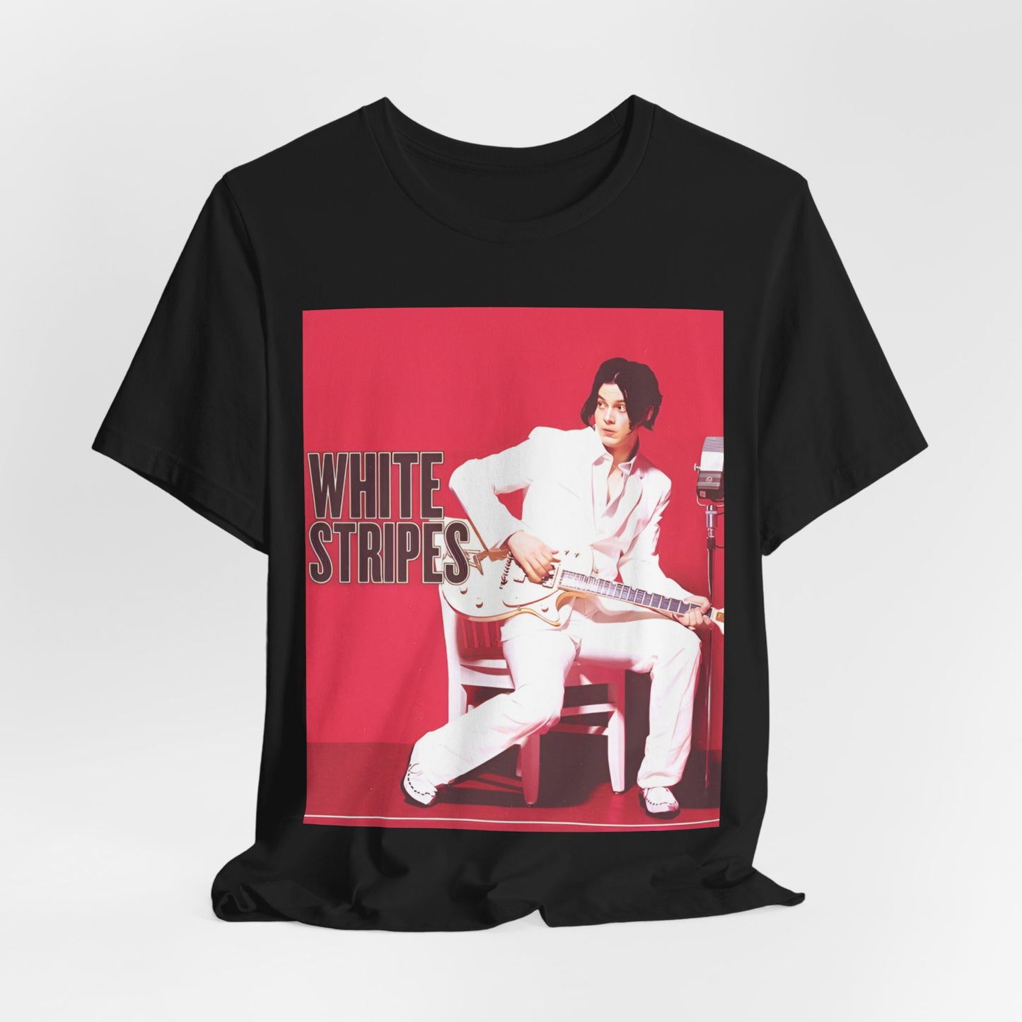A black graphic t-shirt featuring a graphic related to The White Stripes' 'Fell In Love With A Girl' song or era.