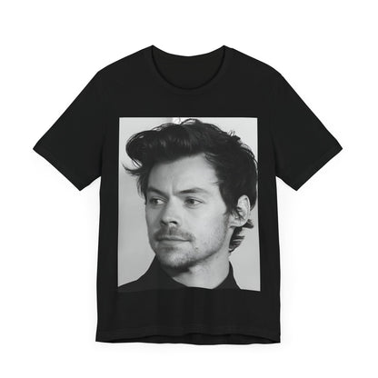 A black graphic t-shirt featuring a black and white, monochrome graphic or photo of Harry Styles.