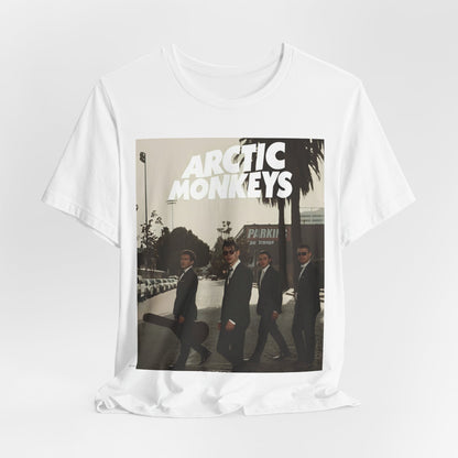 A black graphic t-shirt featuring Arctic Monkeys in a pose or setting similar to the iconic 'Abbey Road' album cover.