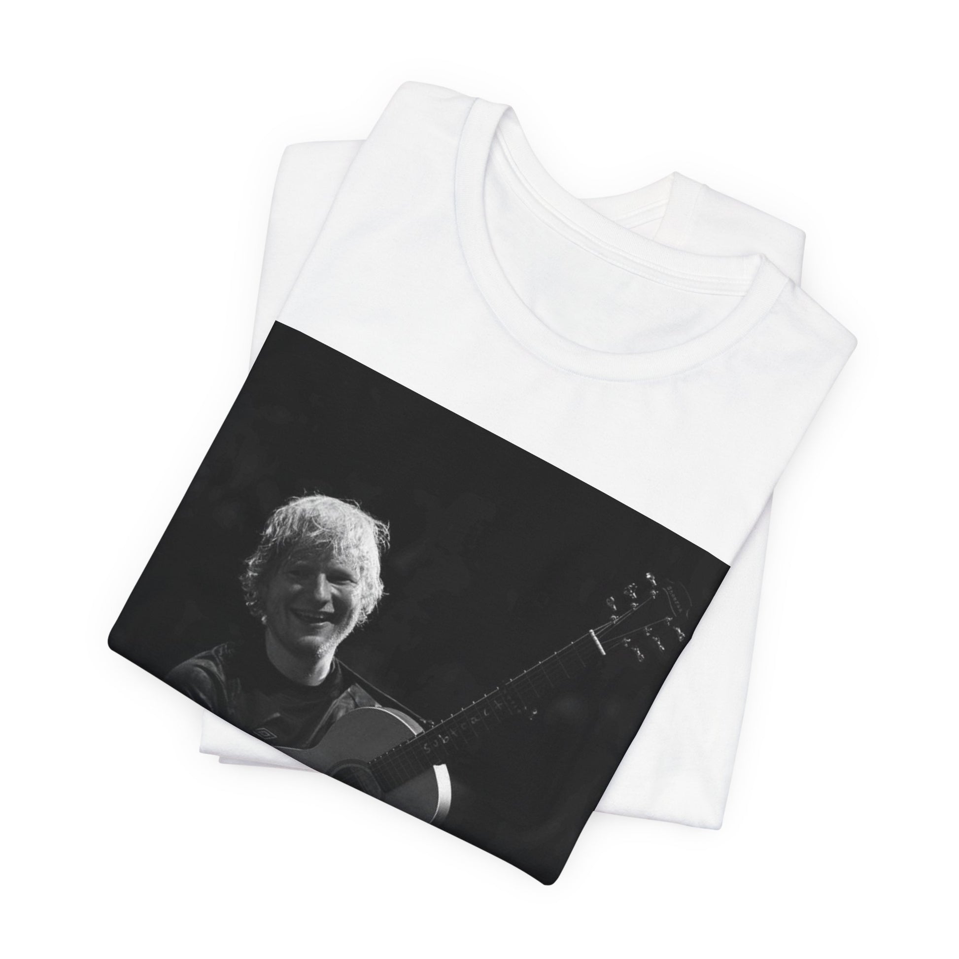 A black graphic t-shirt featuring a photo of Ed Sheeran performing live with his guitar.