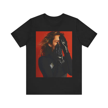 A black graphic t-shirt featuring a graphic of Miley Cyrus with Nashville or country music elements.