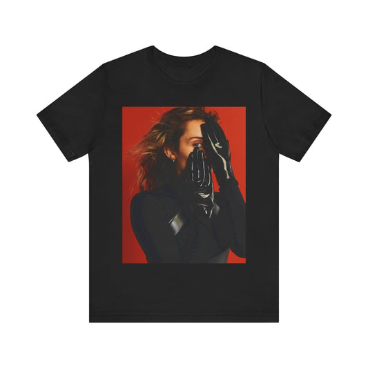 A black graphic t-shirt featuring a graphic of Miley Cyrus with Nashville or country music elements.