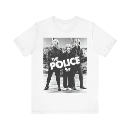 A black graphic t-shirt featuring an 80s pop rock aesthetic black and white graphic of The Police.