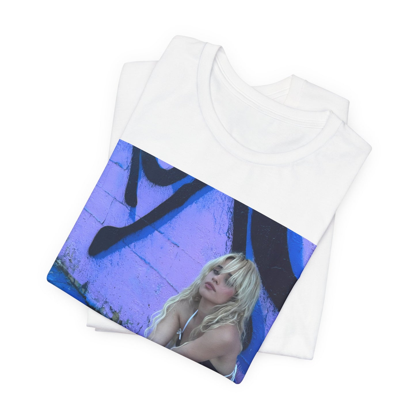 A black graphic t-shirt featuring a photo of Camila Cabello from her "Romance" album era.