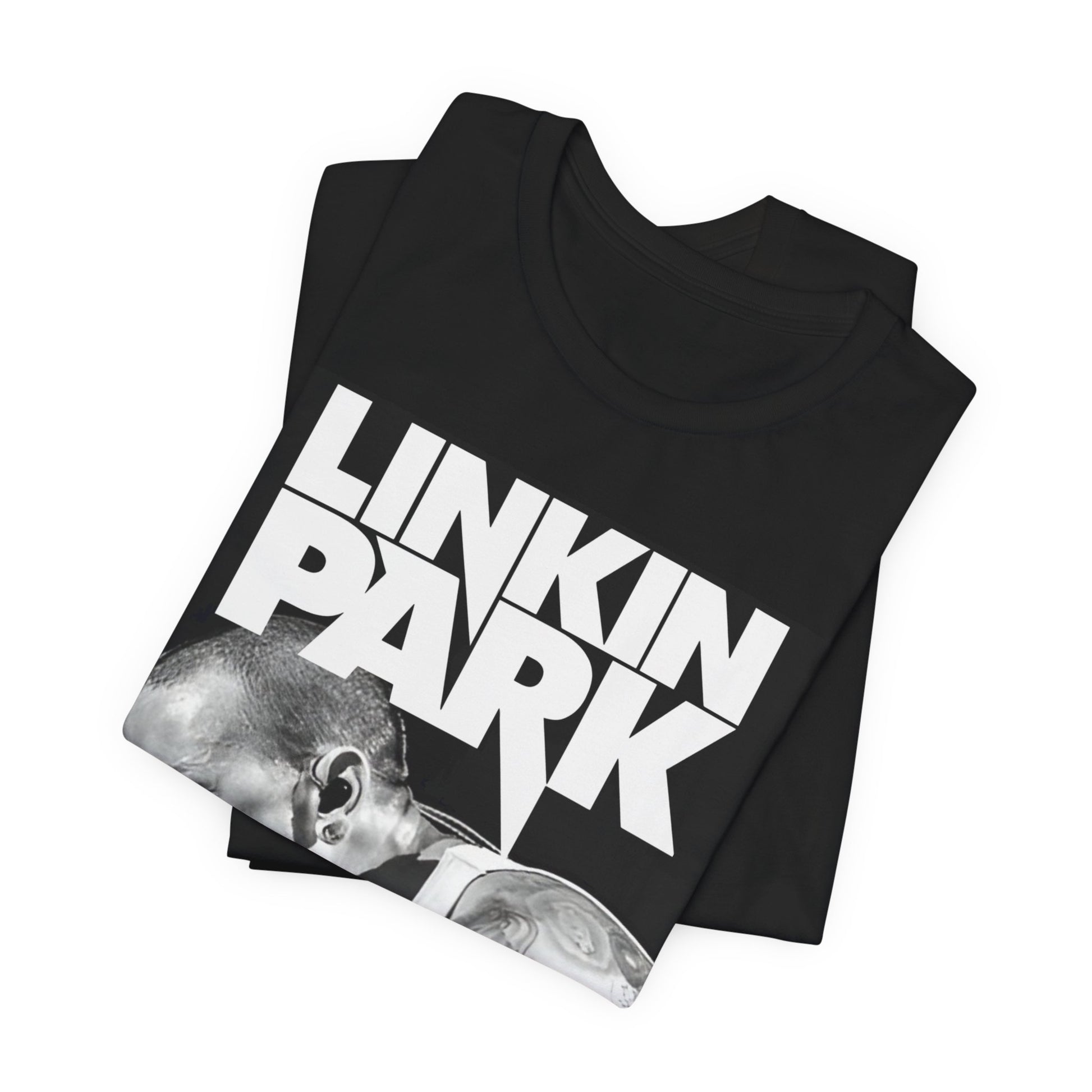 A black graphic t-shirt featuring a black and white graphic or photo portrait of Chester Bennington from Linkin Park.