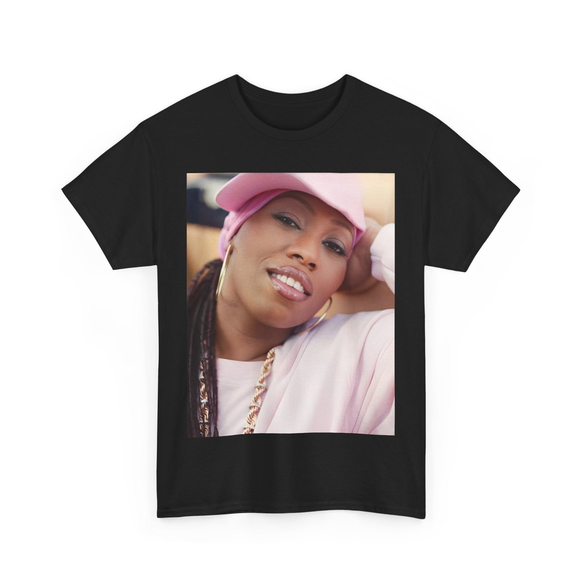 A black graphic t-shirt featuring a 90s rap graphic of Missy Elliott from her early days, emphasizing a raw style.