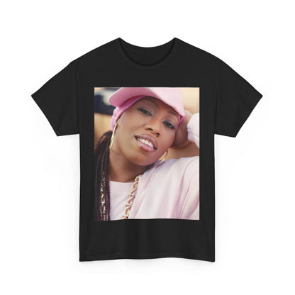 A black graphic t-shirt featuring a 90s rap graphic of Missy Elliott from her early days, emphasizing a raw style.