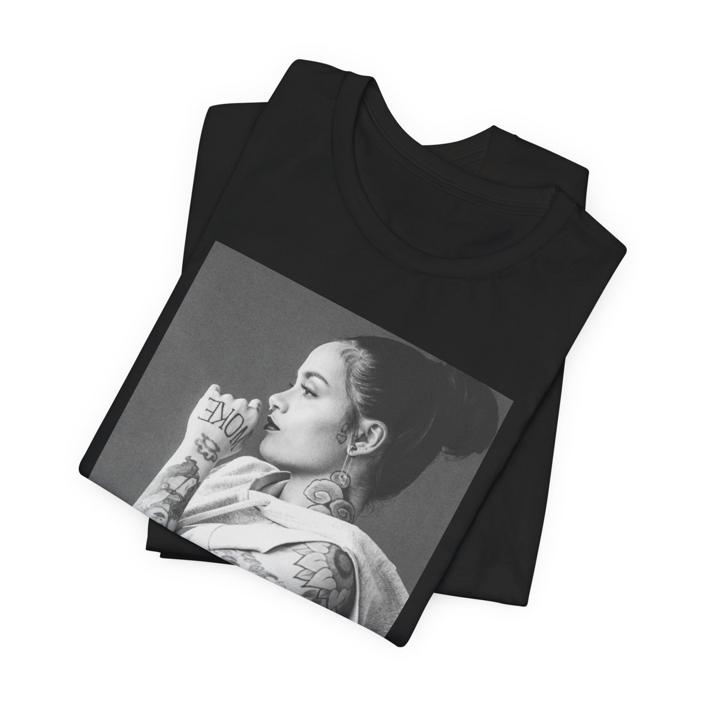 A black graphic t-shirt featuring a black and white, monochrome graphic or photo of Kehlani.