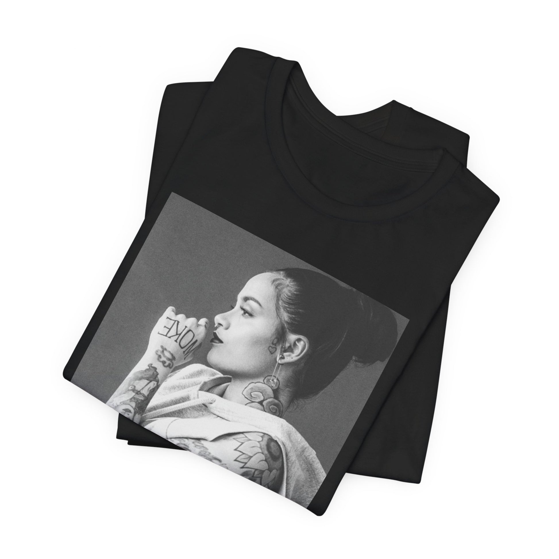 A black graphic t-shirt featuring a black and white, monochrome graphic or photo of Kehlani.