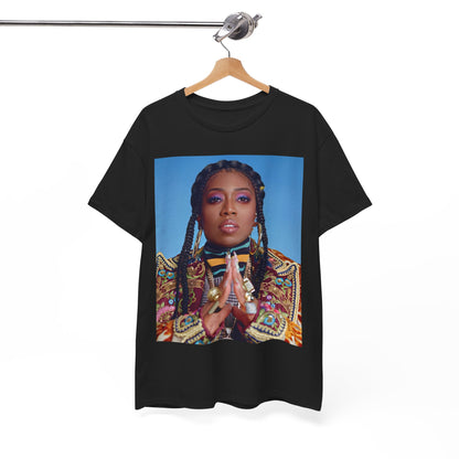 A black graphic t-shirt featuring a graphic of Missy Elliott with a cool, futuristic rap fashion aesthetic.