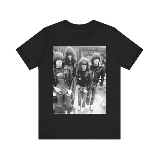 A black graphic t-shirt featuring a retro graphic related to Ramones' 'I Wanna Be Sedated' song or era.