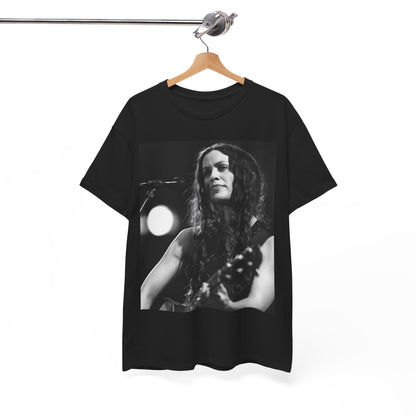 A black graphic t-shirt featuring a 90s-style graphic of Alanis Morissette playing a guitar, with a dynamic expression.