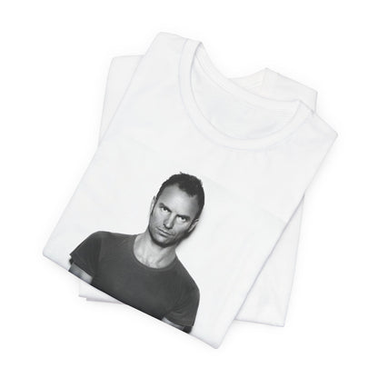 A black graphic t-shirt featuring a black and white portrait photo of Sting.