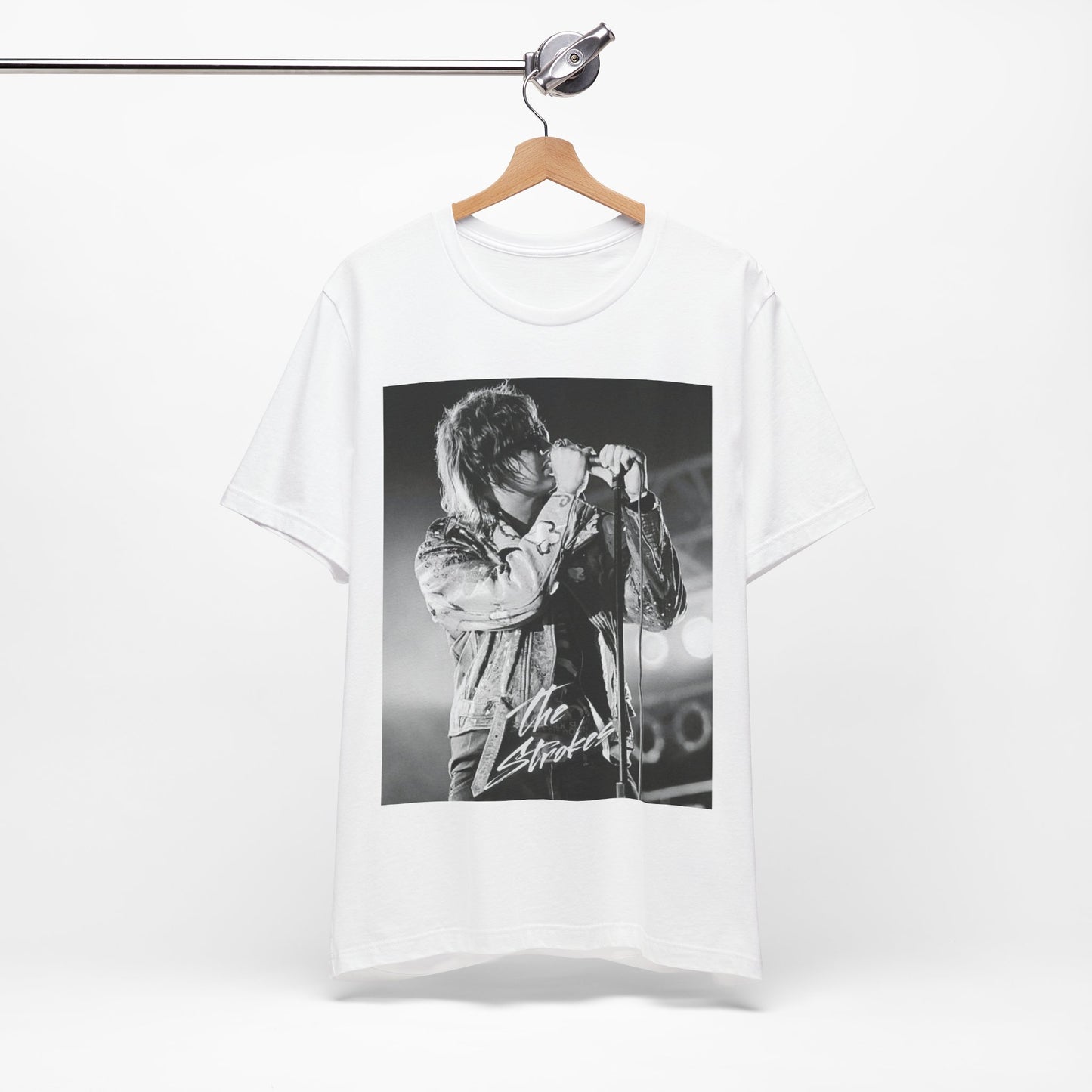 A black graphic t-shirt featuring a vintage graphic related to The Strokes' 'Last Nite' song or era.