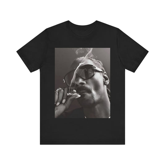 A black graphic t-shirt featuring an iconic black and white shaded portrait graphic of Snoop Dogg.