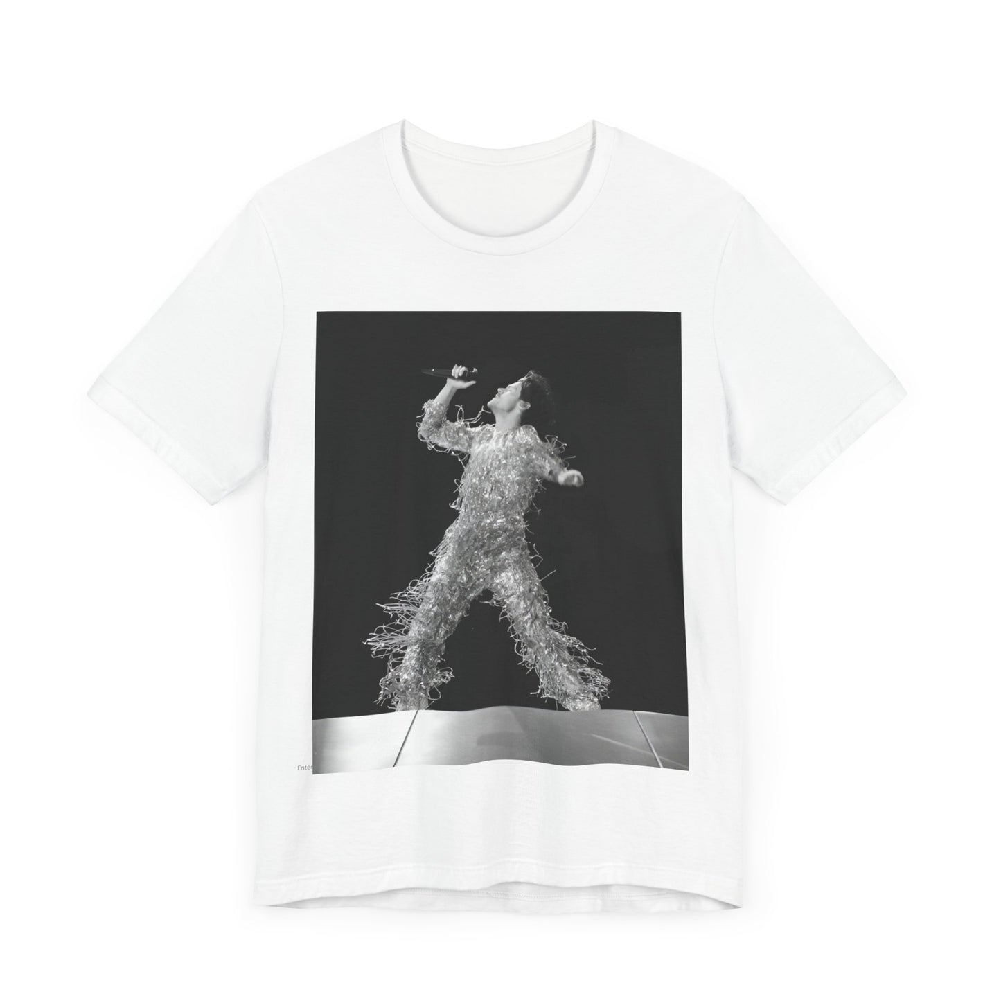 A black graphic t-shirt featuring a boxy pop aesthetic graphic of Harry Styles.
