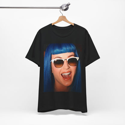 A black graphic t-shirt featuring a retro graphic of Katy Perry with blue hair.