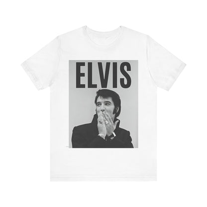 A black graphic t-shirt featuring a retro graphic of Elvis Presley as a 'Rebel With A Cause.'