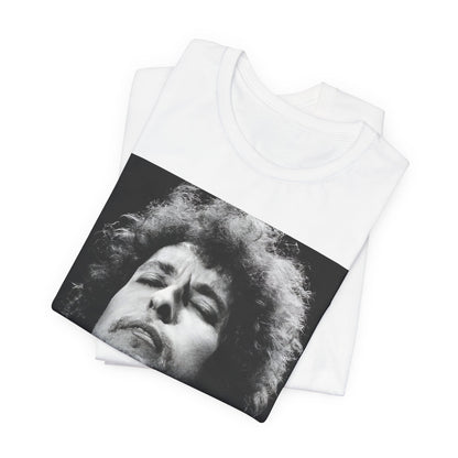 A black graphic t-shirt featuring a retro black and white graphic or photo of Bob Dylan performing live.