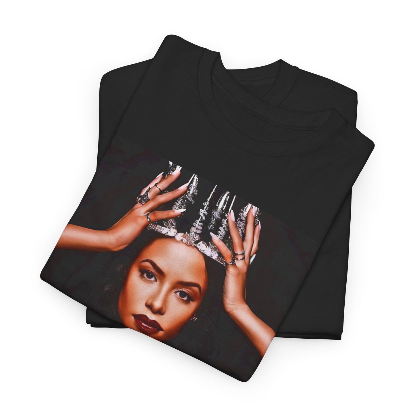 A black graphic t-shirt featuring a boxy graphic related to Aaliyah's 'More Than a Woman' song or era.