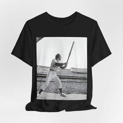 A black graphic t-shirt featuring a black and white graphic or photo related to Elton John's 1975 tour in America.