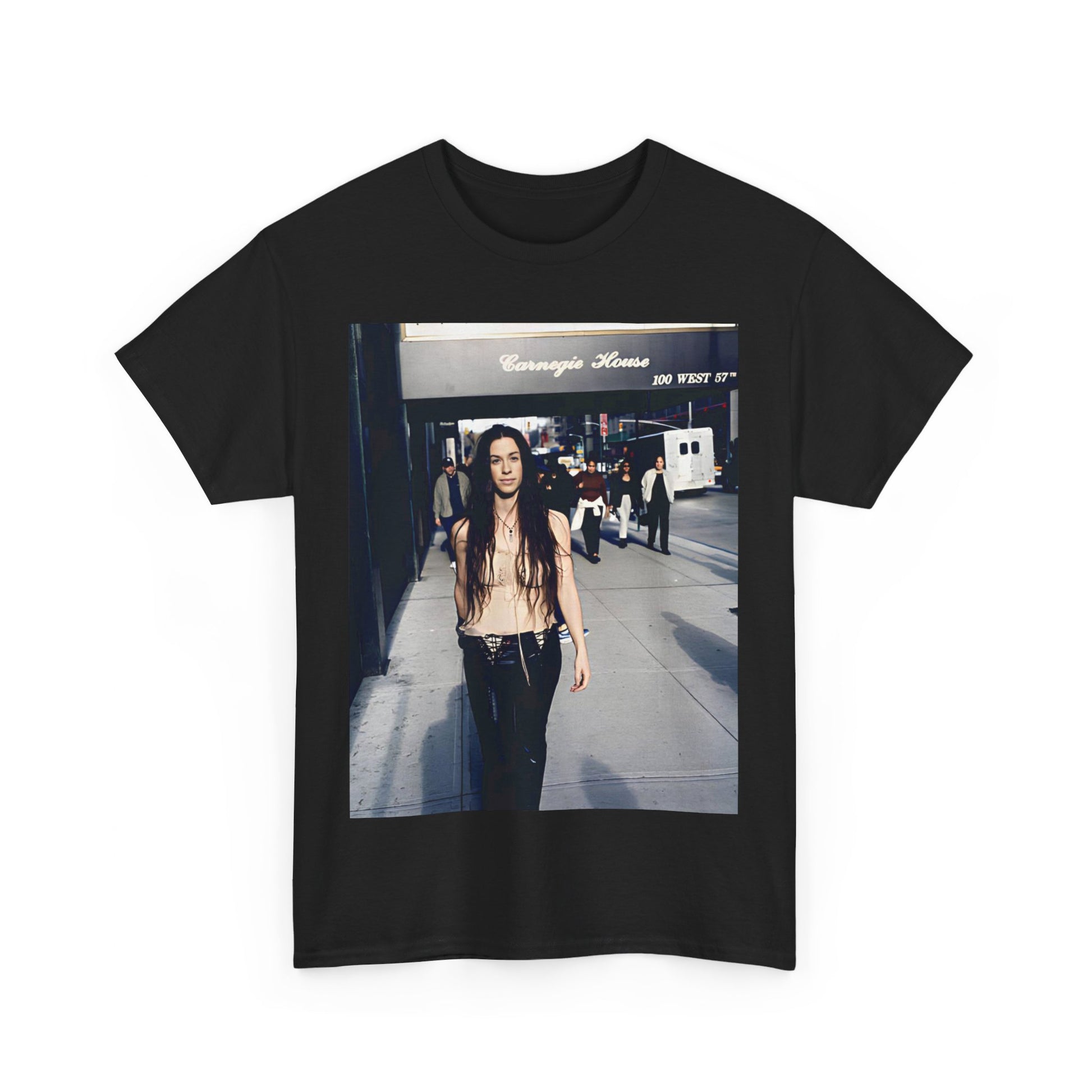 A black graphic t-shirt featuring a 90s-style graphic of Alanis Morissette with New York City elements or skyline in the background.