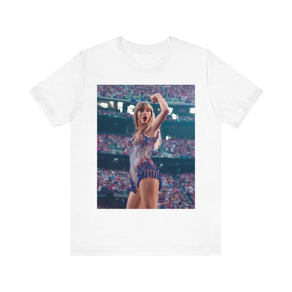 A black graphic t-shirt featuring a graphic or photo of Taylor Swift performing live on stage.