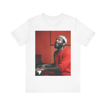 A black graphic t-shirt featuring a graphic of Marvin Gaye with a piano.