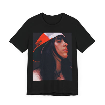 A graphic t-shirt featuring the name 'Billie Eilish' in a raw, urban street-style font.
