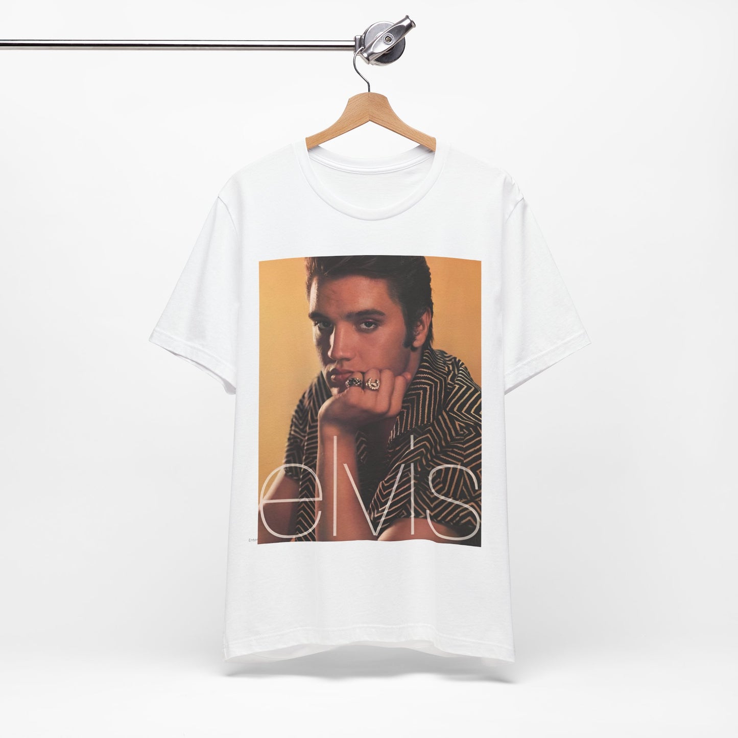 A black graphic t-shirt featuring an aesthetic photo portrait of Elvis Presley.