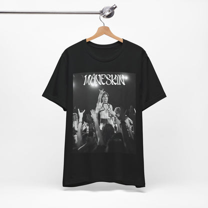 A black graphic t-shirt featuring a graphic or photo of Maneskin performing live.