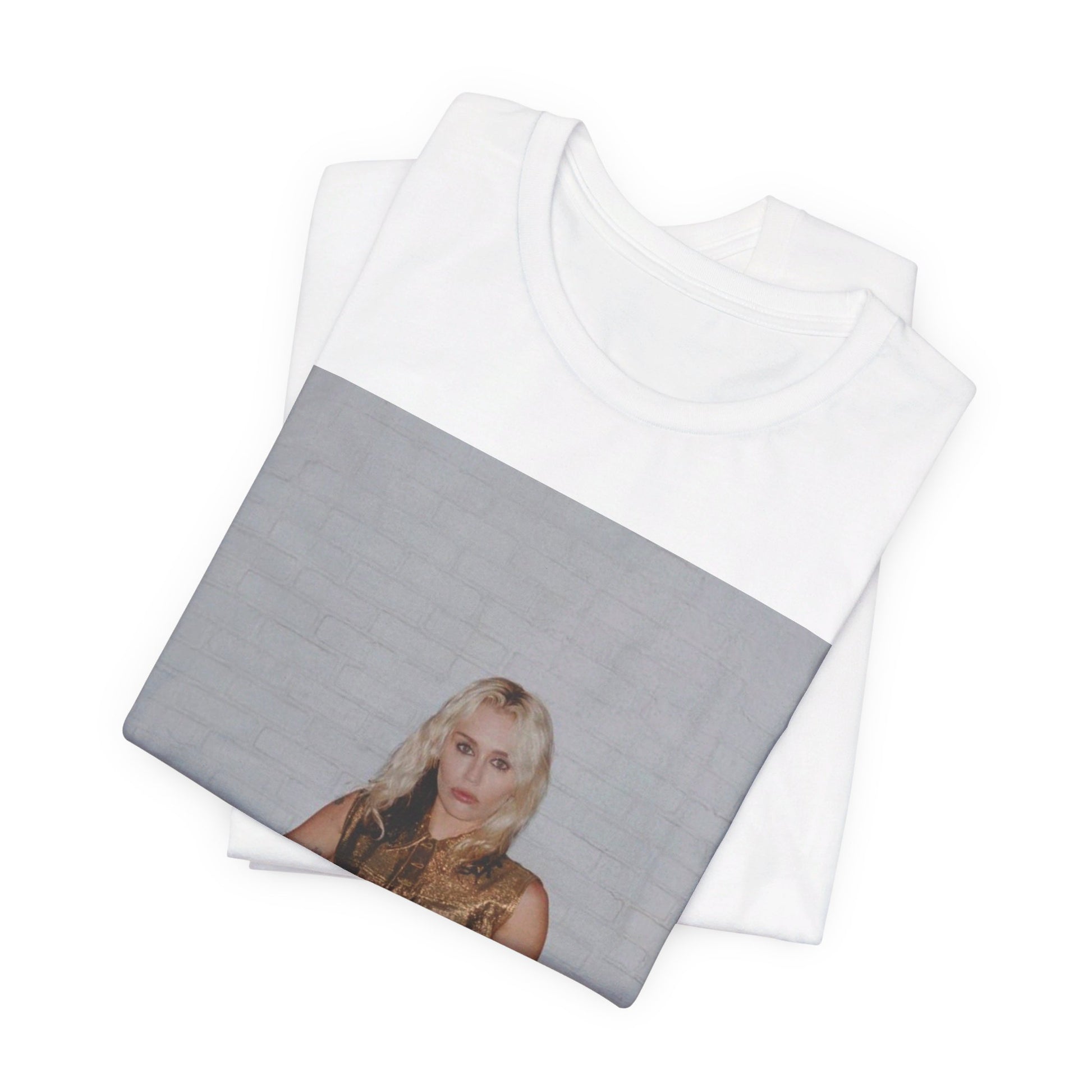 A black graphic t-shirt featuring an iconic fashion graphic of Miley Cyrus.