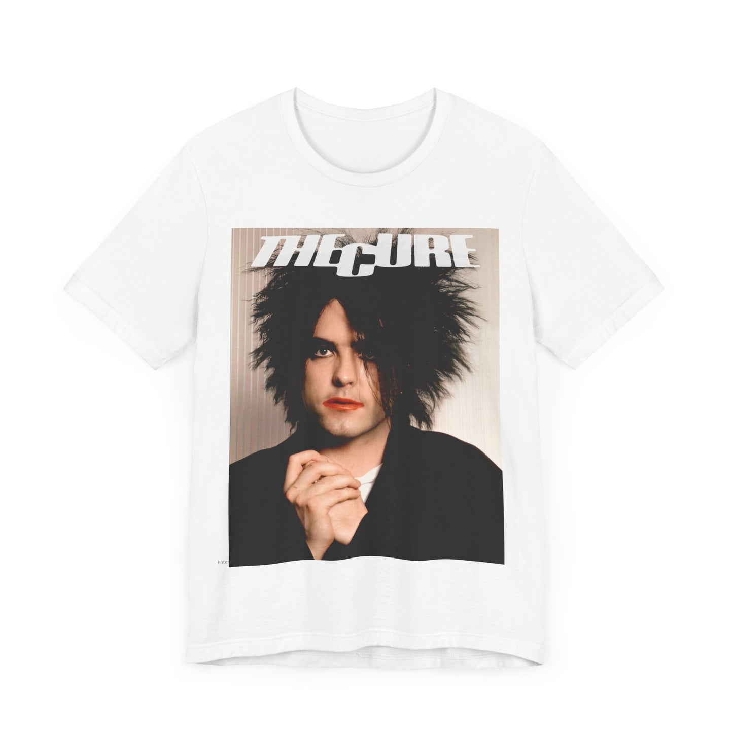 A black graphic t-shirt featuring a 90s portrait photo of Robert Smith from The Cure.