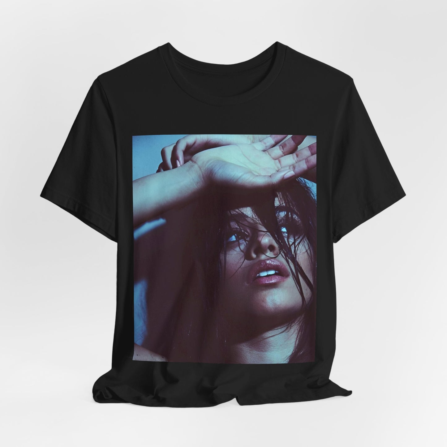 A black graphic t-shirt featuring a graphic related to Camila Cabello's "Señorita" song, possibly with dance-inspired elements.