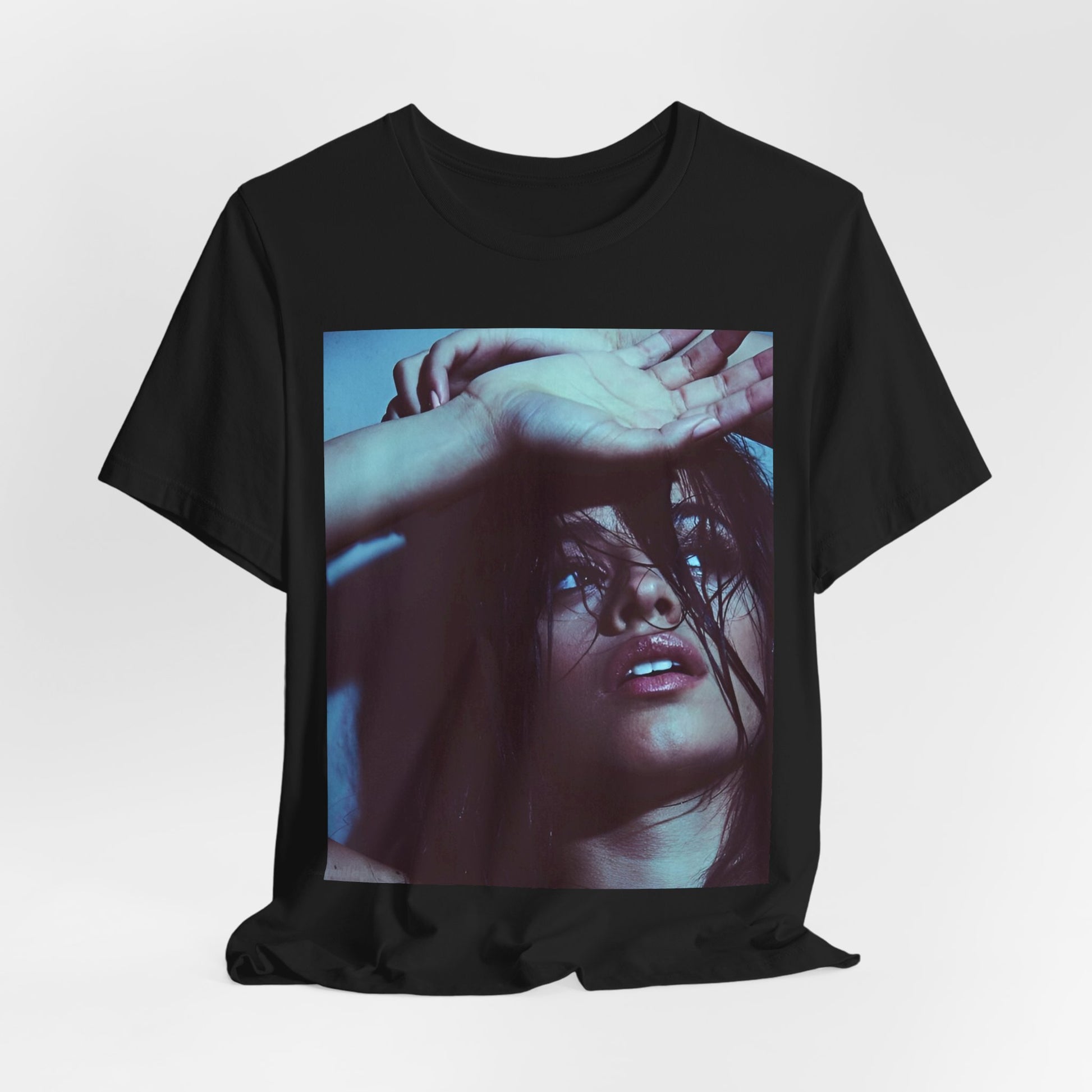 A black graphic t-shirt featuring a graphic related to Camila Cabello's "Señorita" song, possibly with dance-inspired elements.